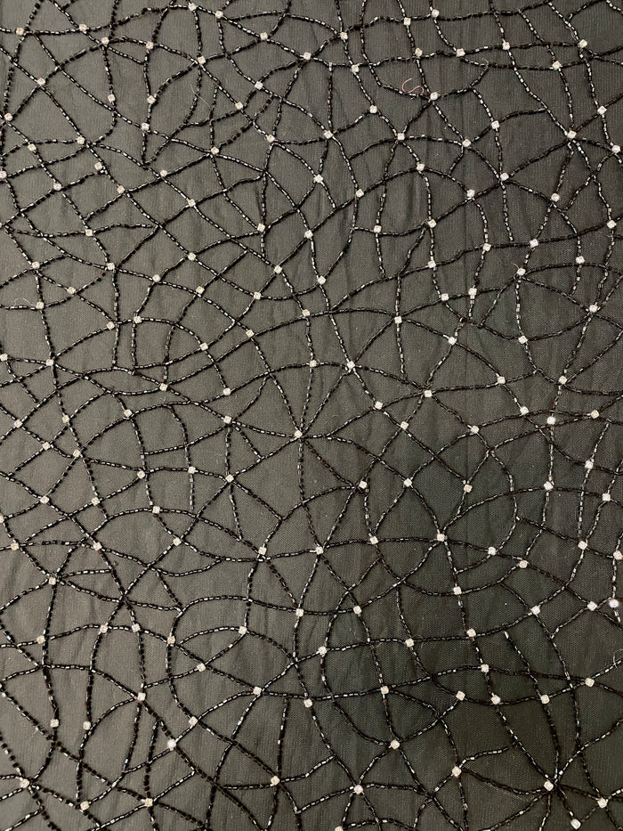 Hand Beaded Warp Web