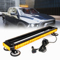 A mini emergency light bar with a magnetic base mounted on the roof of a vehicle, displaying various amber-colored LED lights.